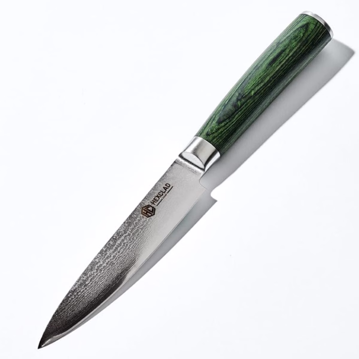 A knife with a green handle and black blade