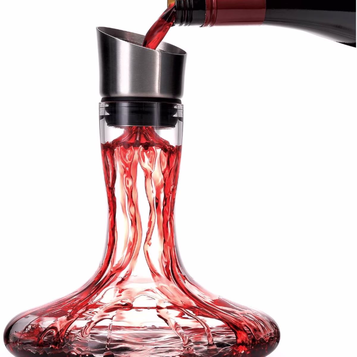 A wine bottle being poured into a decanter