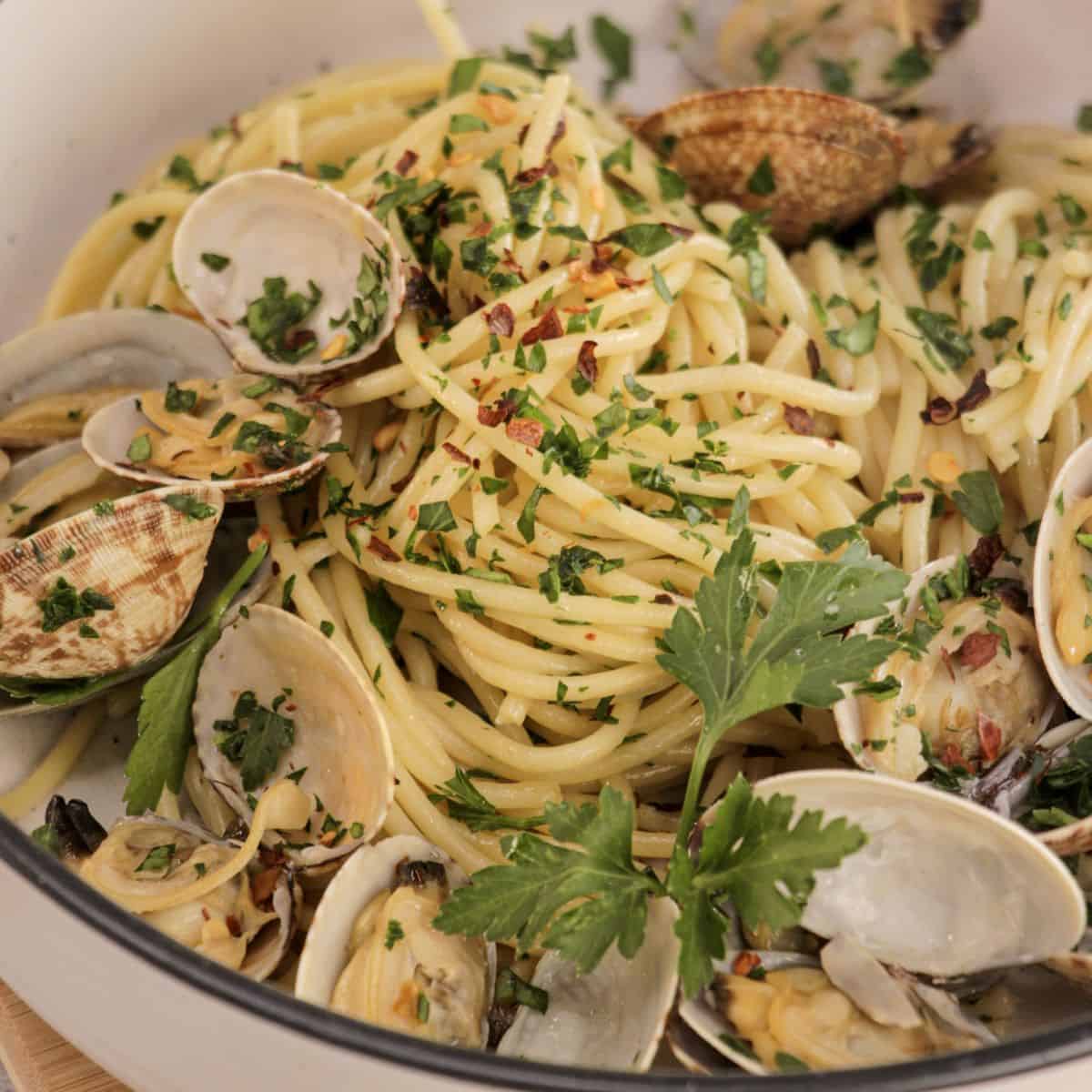 Delicious Italian clam pasta with herbs and fresh clams.